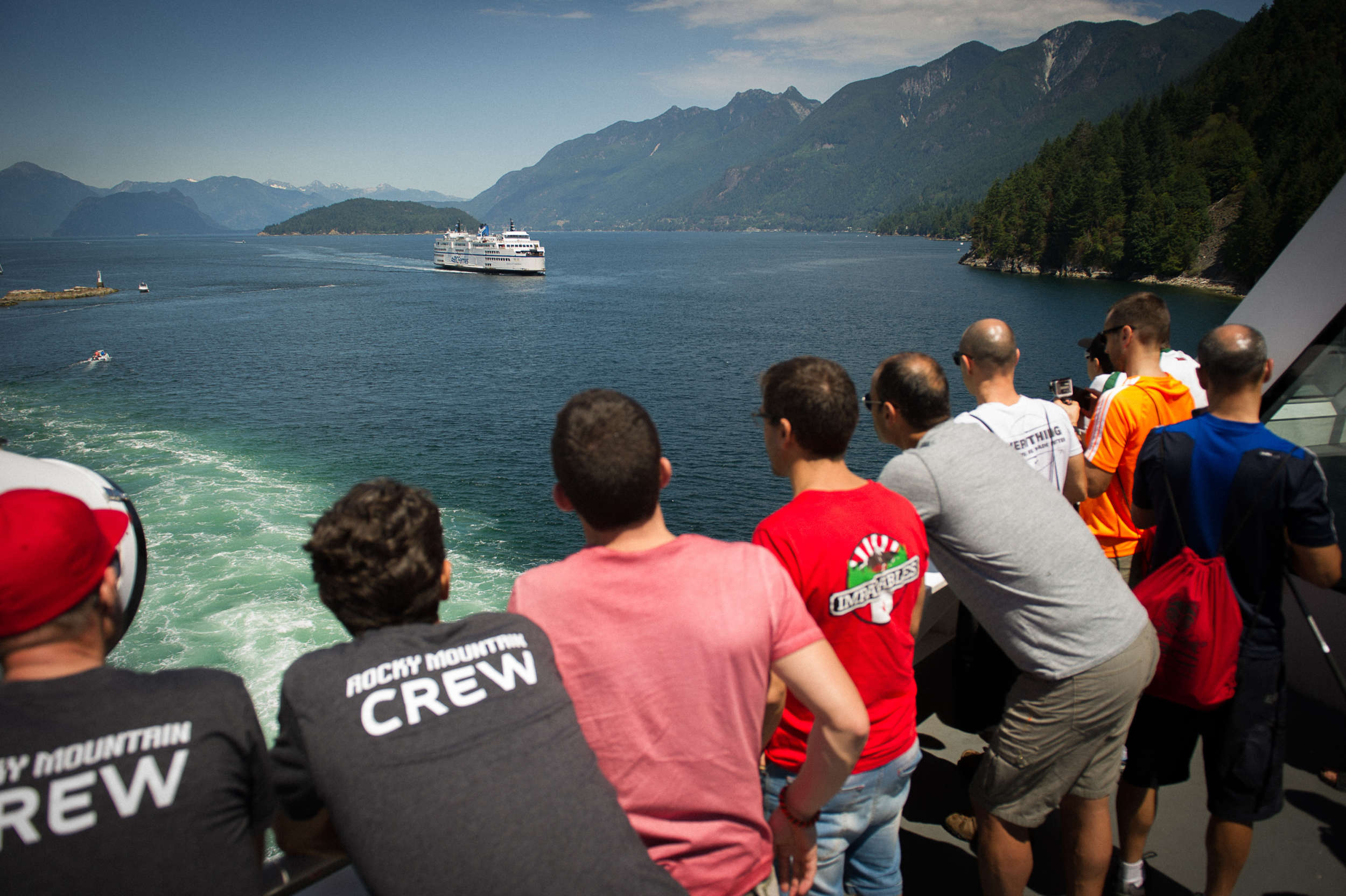 people look at the view off the deck of a bc ferries vessel
