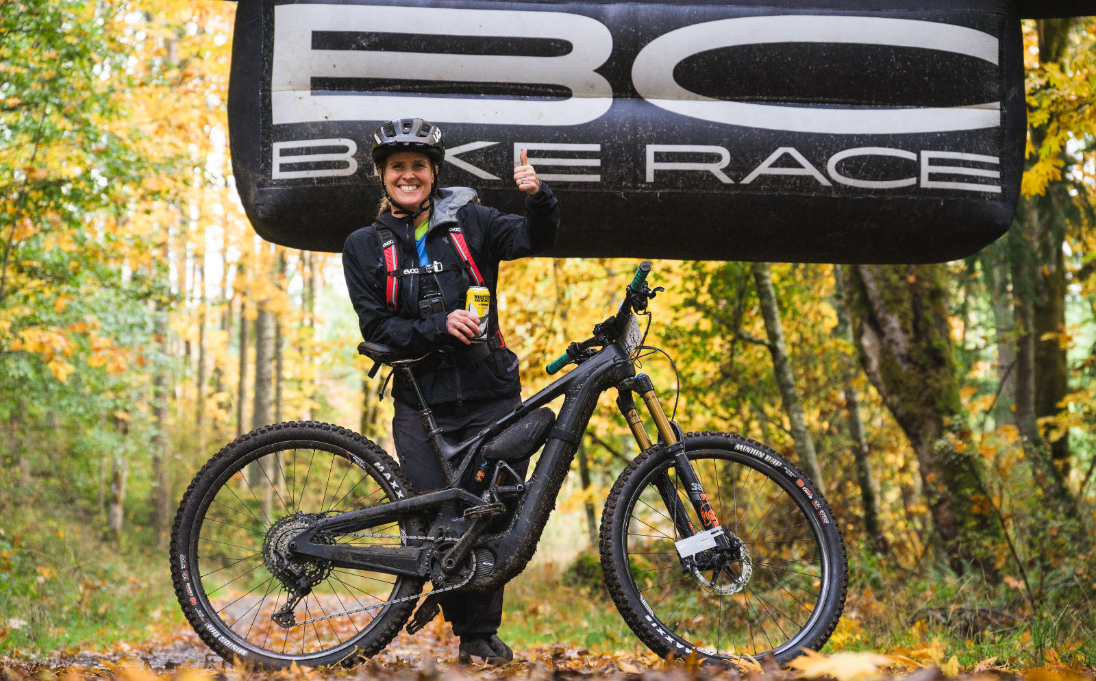 eMountain Biker in front of the BC Bike Race arch